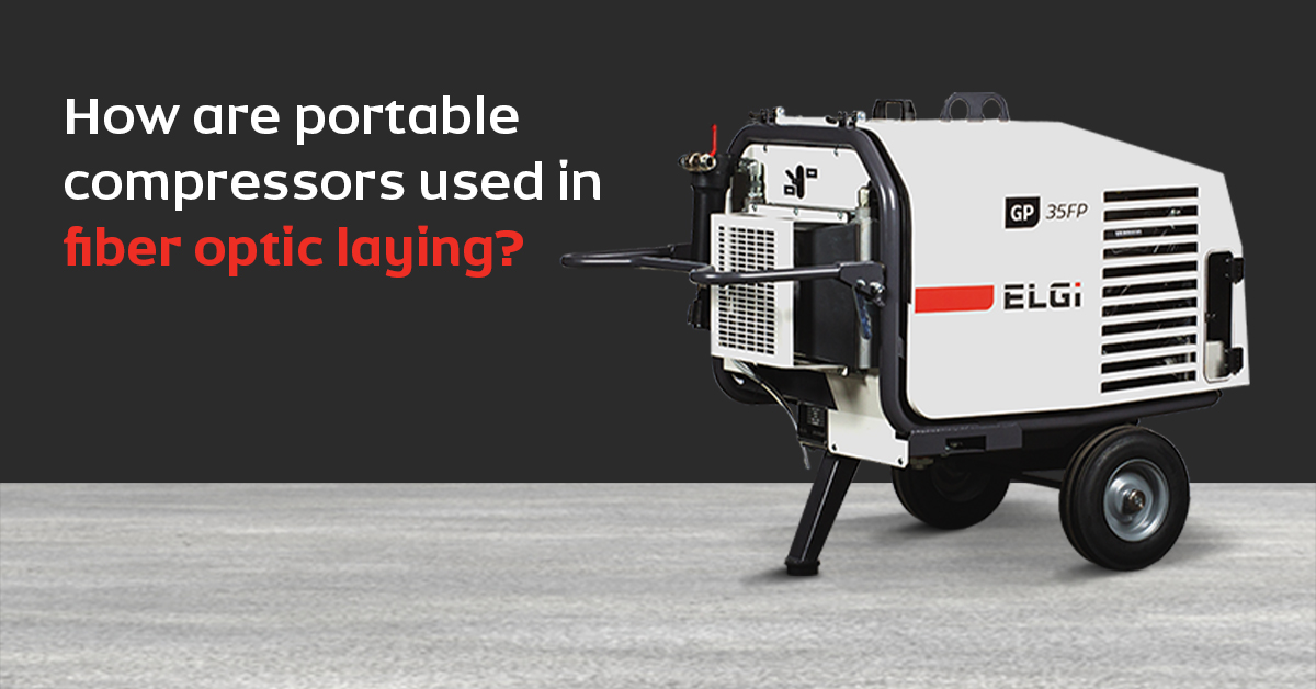 How are portable compressors used in fiber optic laying?